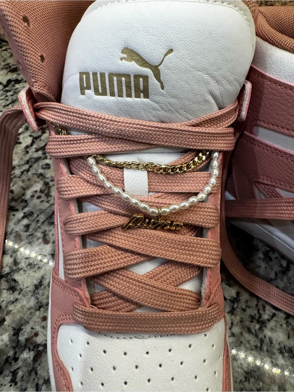 PUMA women’s size 9 Pink and White High-Top Sneakers with bling